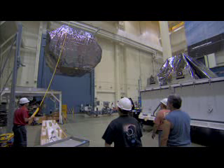 <b>41: HST Servicing Mission 4 Carrier Packing and Shipping to Kennedy Space Center: </b> Engineers pack the SLIC, ORUC and FSS (not shown) carrier systems into specialized shipping containers and drive them to the Kennedy Space Center.