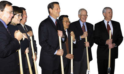 Vice President Al Gore and outgoing Office of Science Director Martha Krebs posed after the groundbreaking with directors of five of the six national laboratories participating in the SNS partnership: From left: Charles Shank of LBNL; Krebs; John Browne of LANL; Gore; Yoon Chang, ANL's interim director; Denis McWhan, who represented BNL's John Marburger; and Al Trivelpiece, then ORNL director.