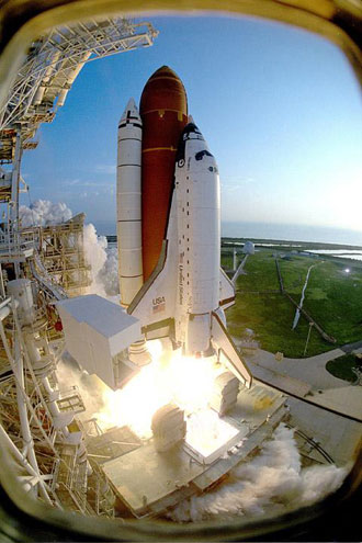 Discovery lifts off.
