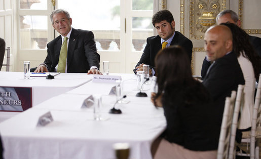 President George W. Bush listens to participants at a roundtable meeting on business exchanges Thursday, June 12, 2008, at the Villa Aurelia in Rome. White House photo by Eric Draper