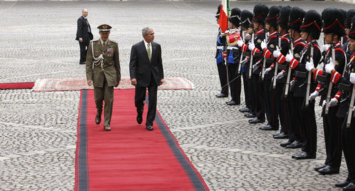 President George W. Bush is escorted by Italian General Rolando Mosca Moschini as he reviews the Guardia D'Onore Thursday, June 12, 2008, on his arrival to the Quirinale Palace in Rome. White House photo by Eric Draper