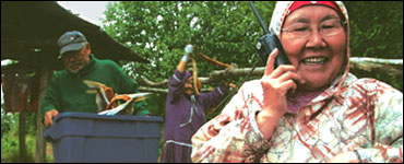 Photo: Native Alaskans woman talking on a cell phone