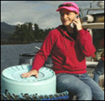 Photo: A woman on a fishing boat.