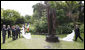 President George W. Bush and Laura Bush, accompanied by French President Nicolas Sarkozy, attend the unveiling of the Flamme de la Liberte sculpture Saturday, June 14, 2008, at the U.S. Ambassador's residence in Paris. White House photo by Eric Draper