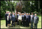 President George W. Bush, Laura Bush, and members of the U.S. delegation, join French President Nicolas Sarkozy and members of the French delegation, for a group photo following the unveiling of the Flamme de la Liberte sculpture Saturday, June 14, 2008, at the U.S. Ambassador's residence in Paris. White House photo by Shealah Craighead