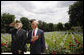 Two U.S. World War II veterans salute during the wreath-laying ceremony Saturday, June 14, 2008, at the Suresnes American Cemetery and Memorial in Suresnes, France. White House photo by Eric Draper