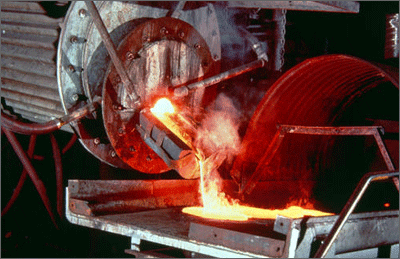 Metal castings are made from either ferrous or non-ferrous alloys by melting the metal and pouring it into a mold, until it can be removed when cooled. This is an example of an energy intensive process.