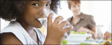 Woman drinking a glass of water