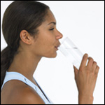 Woman drinking a glass of water