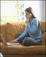 Photo: A woman talking on a cell phone.