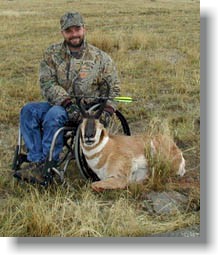 Man in wheelchair with pronghorn.