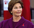 Image of Mrs. Bush debuting the Red Dress Pin