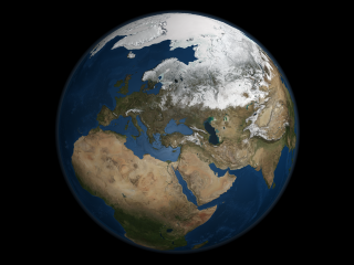 This image presents a global view over  Europe and Scandinavia with Arctic sea ice shown on  March 9, 2006.  Land areas display the average seasonal landcover from March, 2004.