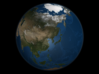  This image presents a global view over Asia with Arctic sea ice shown on September 21, 2005. - the day on which the sea ice was at the minimum extent for the year.  Land areas display the average seasonal landcover from September, 2004.