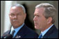 President George W. Bush outlines his plan to resolve the conflict in the Middle East as Secretary of State Colin Powell stands by his side in the Rose Garden Thursday, April 4. White House photo by Paul Morse.