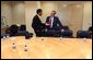 President George W. Bush meets one-on-one with John Bryant, Founder, Chairman and CEO of Operation HOPE, after a roundtable discussion with community leaders at First African Methodist Episcopal Renaissance Center in Los Angeles, Calif., Monday, April 29.  White House photo by Eric Draper.