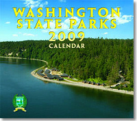 2009 State Parks Calendar cover with photo of Cama Beach State Park, water, cabins, shoreline and trees