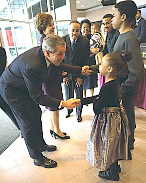 Meeting the family of Pastor John K. Jenkins, Sr., at the First Baptist Church of Glenarden in Landover, MD, which holds an annual service honoring Dr. Martin Luther King, Jr., January 20.