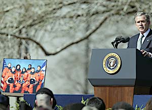 Speaking at the memorial service for the crew of the Space Shuttle <em>Columbia</em> at NASA's Lyndon B. Johnson Space Centr in Houston, TX, February 4.