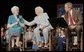 President George W. Bush and his mother Barbara Bush talk with Social Security recipient Frances Heverly, left, Friday, July 22, 2005, during a Conversation on Senior Security at the Boisfeuillet Jones Civic Center in Atlanta, to talk about Social Security and Medicare.  White House photo by Paul Morse