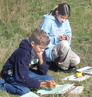 Sterling, Colorado area high school students study the soils education curriculum  prior to the field tests