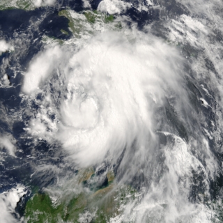 July 6, 2005 15:05 (UTC)
Tropical Storm Dennis spanned from the northern tip of Venezuela to the southern half of the island of Hispaniola in this image.  Dennis was here growing to winds of 110 kilometers per hour (70 mph).