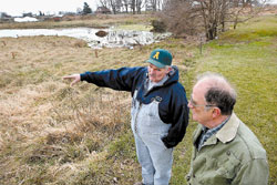 Mike Stiles (left) of Waverly Farm talks with Bud Nagelvoort, chairman of the Lord Fairfax Soil and Water Conservation District 