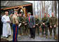 President George W. Bush visits with military personnel after attending a church service at Evergreen Chapel at Camp David, Maryland, Sunday, April 16, 2006.  White House photo by Eric Draper