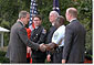 Inviting several charitable organizations to the White House Rose Garden, President Bush thanks representatives from the groups that helped with the relief effort at the World Trade Center and the Pentagon. 