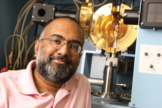 Easo George with the high-temperature optical floating zone furnace used to produce monocrystalline molybdenum alloy micro-pillars