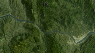A year 2000 bird's eye view of the Three Gorges Dam region as seen with Landsat-7.  Construction of the dam has begun.
