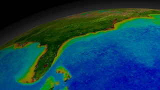 This animation begins with a wide shot of the United States and zooms down to the Eastern seaboard of the United States while cycling through nearly ten years of SeaWiFS biosphere data.