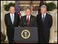 President George W. Bush announces a nationwide charitable fundraising effort to be led by former President George H.W. Bush, left, and former President Bill Clinton to aid victims of last week's earthquake and tsunamis in South Asia in the Roosevelt Room, Monday, January 3, 2005.   White House photo by Tina Hager