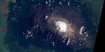 An animation of the shrinking snow cap on Mount Kilimanjaro from Landsat imagery