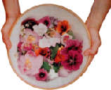 a bowl of edible flowers