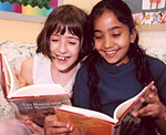 Two Girls Reading and Giggling