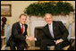 President George W. Bush welcomes Poland’s Prime Minister Donald Tusk to the Oval Office of the White House, Monday, March 10, 2008.  White House photo by Joyce N. Boghosian
