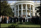 President Bush stands with Laura Bush, Vice President Dick Cheney and Mrs. Cheney as they observe a moment of silence, on the South Lawn, in honor of 9/11 victims September 11, 2005. This marks the fourth anniversary of terrorist attacks on both the World Trade Center and The Pentagon. White House photo by Krisanne Johnson