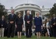 President George W. Bush, Mrs Laura Bush, Vice President Dick Cheney and Mrs Lynne Cheney bow their heads for a moment of silence on the Sauth Lawn of the White House Tuesday, Sept. 11, 2007 in memory of those whose lives were lost on Sept. 11, 2001.