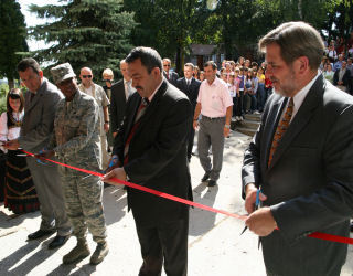 (from left to right) BiH Minister of Defense Selmo Cikotic, Assistant Adjutant General, Maryland Air National Guard Solomon, Vlasenica Mayor Dragomir Stupar and US Ambassador to BiH Charles English cut the ribbon at the opening ...