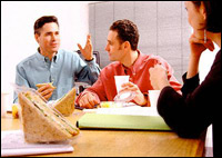 photo of people eating in conference room