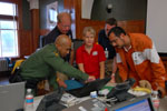 State, local, and federal partners work alongside nongovernmental volunteer organizations to assess needs and identify resources in response to Hurricane Dolly at the Cameron County Emergency Operations Center. FEMA Photo / John Shea