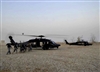 An Iraqi special weapons and tactics team, alongside U.S. Special Forces soldiers, board helicopters to conduct an operation in a village in the Bani Sayd region of the Diyala province that is known to be a bed-down site for Islamic State of Iraq and al-Qaeda cell leaders, Iraq, Sept. 5, 2008. 