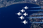 Thunderbirds Perform Flyover  - Click for high resolution Photo