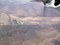 NOAA photo of flooded road and railroad tracks along Mississippi River northeast of Desoto, Wis.