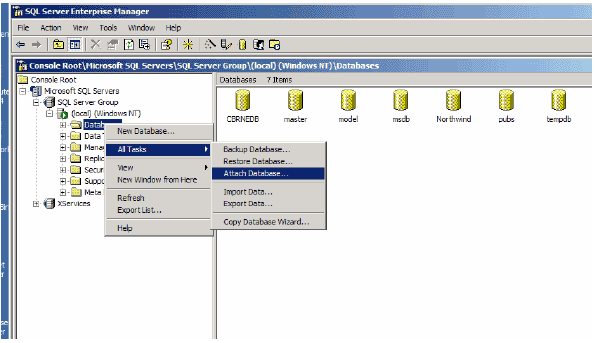 Screen shot shows a File Manager titled 'SQL Server Enterprise Manager.' The file management tree is opened to select a folder labeled '(local) (Windows NT),' then a subfolder labeled 'Database'; from the menu beside this subfolder, the 'All Tasks' option and, 'Attach Database' are selected.