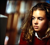 Photograph of girl on computer