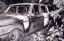 Photograph of burned car.