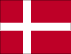 Flag of Denmark is red with a white cross that extends to the edges of the flag; the vertical part of the cross is shifted to the hoist side.