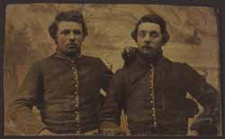 [Ruben Farwell (right) and an unidentified man, half-length studio portrait, facing front, wearing military uniforms]